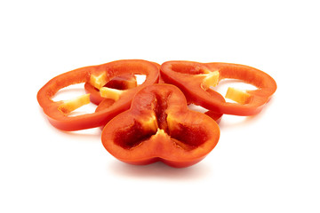 Red chilli slices separated on a white background