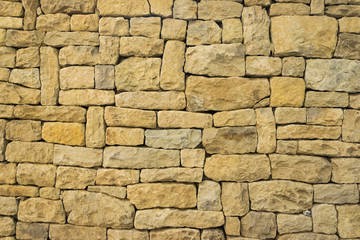stone wall shaped to mosaic 