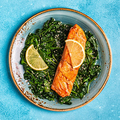 Grilled salmon with spinach.