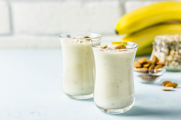 Vanilla spiced breakfast smoothie with coconut flakes. Selective focus, space for text.