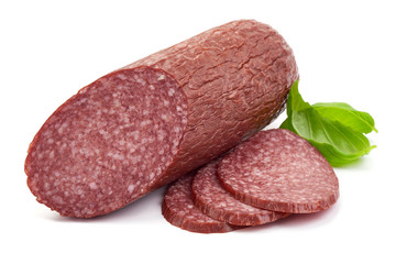 Dried Smoked Salami with basil leaves, close-up, isolated on a white background