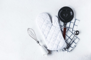 dishes and kitchen accessories for baking on the Kitchen table on a white background