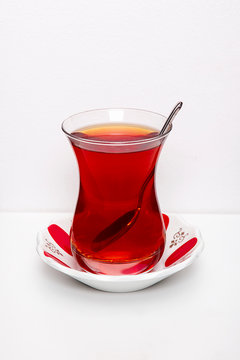 One cup of tea over white background.