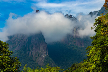 Beautiful landscape of mountains and morning mist. Mountain of the Finger of God. city of Teresópolis, state of Rio de Janeiro, Brazil, South America. 