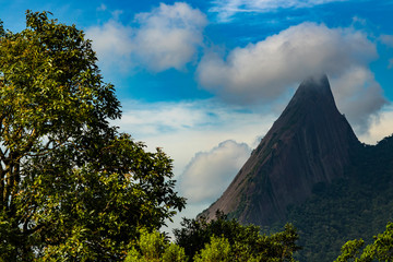 Escalavrado mountain, the National Park of the Organ in the State of Rio de Janeiro, Brazil, South America. Cloud on the mountain top. 