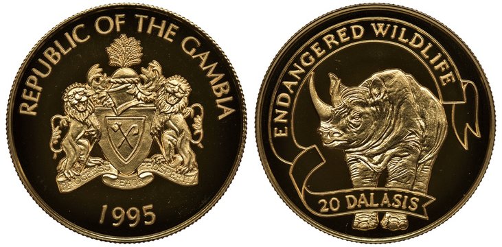 The Gambia Gambian golden coin 20 twenty dalasis 1995, subject Endangered wildlife, shield with supporters, rhinoceros,