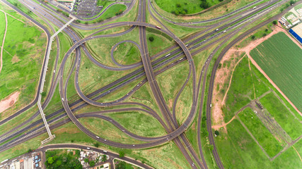 Flyover the complex road junction. Sunny day. Modern Brazil.