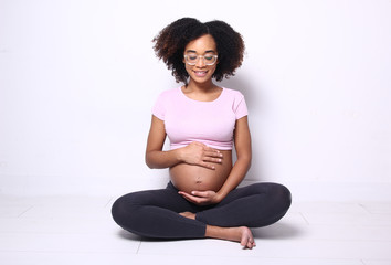 Portrait of a beautiful happy commercial pregnant woman