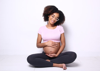 Portrait of a beautiful happy commercial pregnant woman