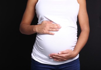 Portrait of a beautiful happy commercial pregnant woman