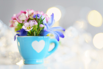 cup with flowers