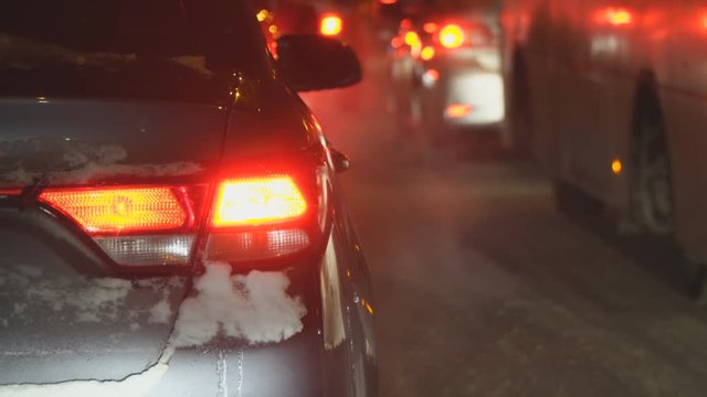 Cars in traffic in winter at night