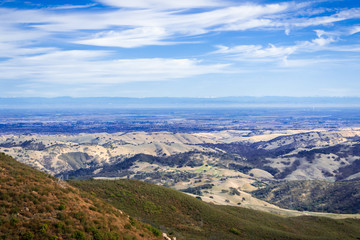 Fototapeta premium View towards the valley surrounding Stockton; Sierra mountains in the background; Mt Diablo State Park, Contra Costa county, San Francisco bay area, California