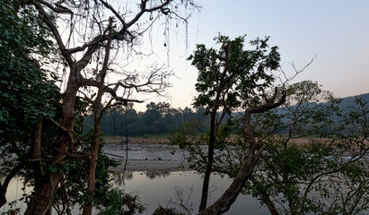Sunset over Ramganga River in Jim Corbett National Park, India