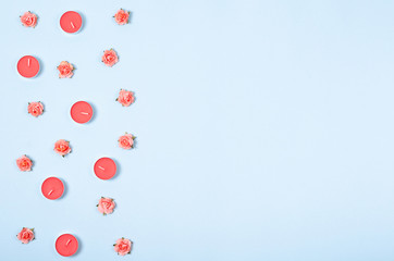 Flat lay arrangement of candles and flowers for mock up design, table top view image of decoration valentine's day background