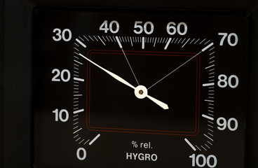 Hygrometer is showing too low humidity in the room. Close-up.