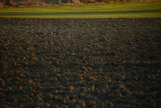 tractors sowing and working fields in the province of alava (the Basque country)
