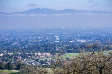 Aerial view of Cupertino and San Jose, Silicon valley; south San Francisco bay area; Mount Hamilton summit (and the observatories) in Diablo mountain range in the background; California