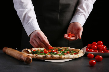chef making pizza