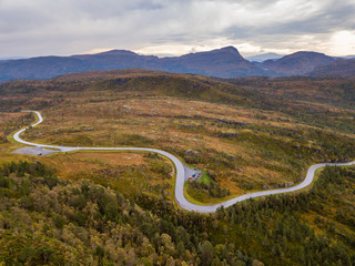 Drone Photo of the Road Leading to Fjord in Gammellaven with a Dramatic Sky in Background