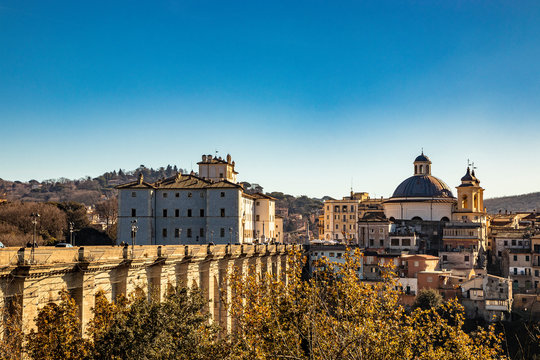 View of Ariccia, with the monumental bridge, the baroque Chigi palace and the church of Santa Maria Assunta by Gian Lorenzo Bernini. Castelli Romani, Lazio, Italy.