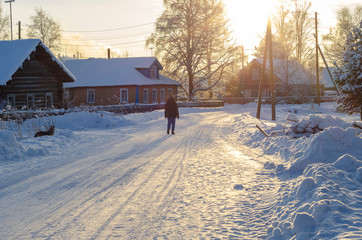 wooden house in the snow