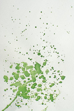 Green wet splatter watercolor background © artesiawells