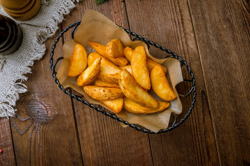 The potatoes wedges on the Board