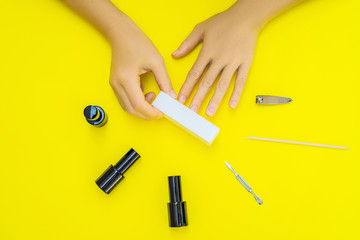 Woman Hands Care. Top View Of Beautiful Smooth Woman's Hands With Professional Nail Care Tools For...