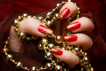 golden glittered red nails