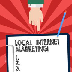 Handwriting text writing Local Internet Marketing. Concept meaning Reach the customers that are closest to you Hu analysis Hand Pointing Down to Clipboard with Blank Bond Paper and Pencil