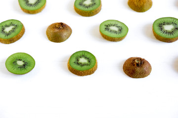 Naklejka na ściany i meble Kiwi sliced pattern. Fresh and ripe kiwi slices. Healthy food. Healthy fruits