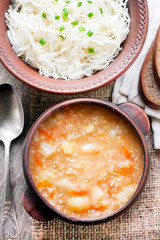 Kapustnyak - traditional Ukrainian winter soup with sauerkraut, millet and meat
