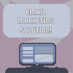 Writing note showing Email Marketing Solution. Business photo showcasing helping customers to solve their problems Mounted Computer Screen with Line Graph on Desk Blank Color Text Box