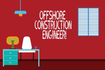 Text sign showing Offshore Construction Engineer. Conceptual photo Oversee the facility in a marine environment Work Space Minimalist Interior Computer and Study Area Inside a Room photo