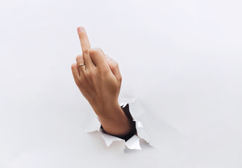 Middle finger, offensive gesture. Fuck you concept. Aggressive reaction.