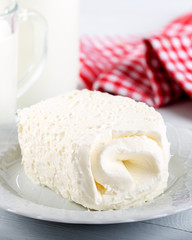 Clotted cream (butter cream) for Turkish breakfast / Kaymak and glass of milk