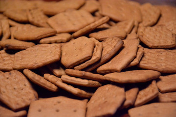 Cookies located on a flat surface occupies the entire area of the image.