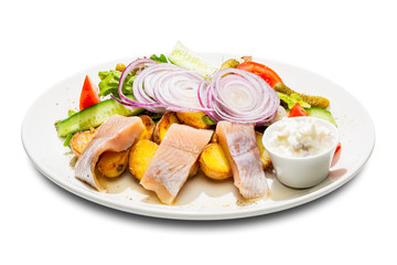 herring appetizer with potatoes and vegetables