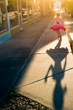 Girl dancing with shadow