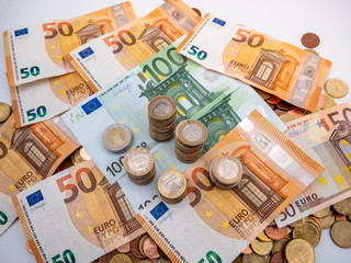 Image of Euro money in coins and bills close up