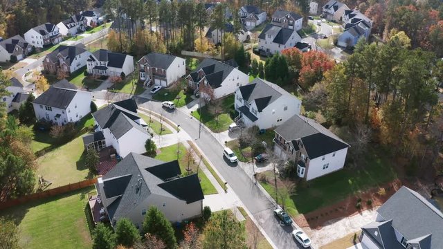 Aerial drone flyover shot over idyllic neighborhood