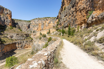 path to Our Lady of Jaraba Sanctuary at Barranco de la Hoz Seca canyon next to Jaraba town, province of Zaragoza, Aragon, Spain