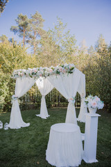 arch for the wedding ceremony in fall in the park