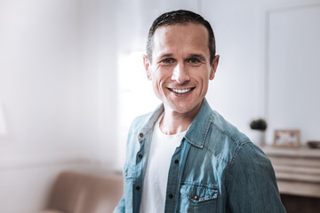 Portrait of a happy delighted man