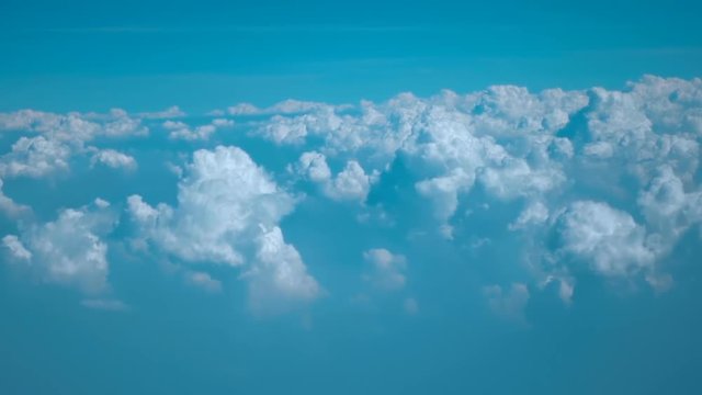 Beautiful cloudy landscape from height of flight of the plane. Fly on the height of the clouds