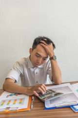 Vertical photo of young businessman feel depressed and stressed with bad business result