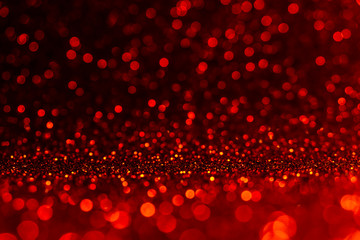 Hot and dark defocused red lights for background.