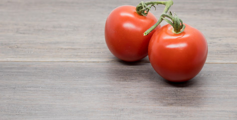 tomatoes on wooden table