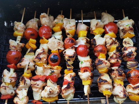 Roasting Frigarui ,skewers,on an outdoors grill